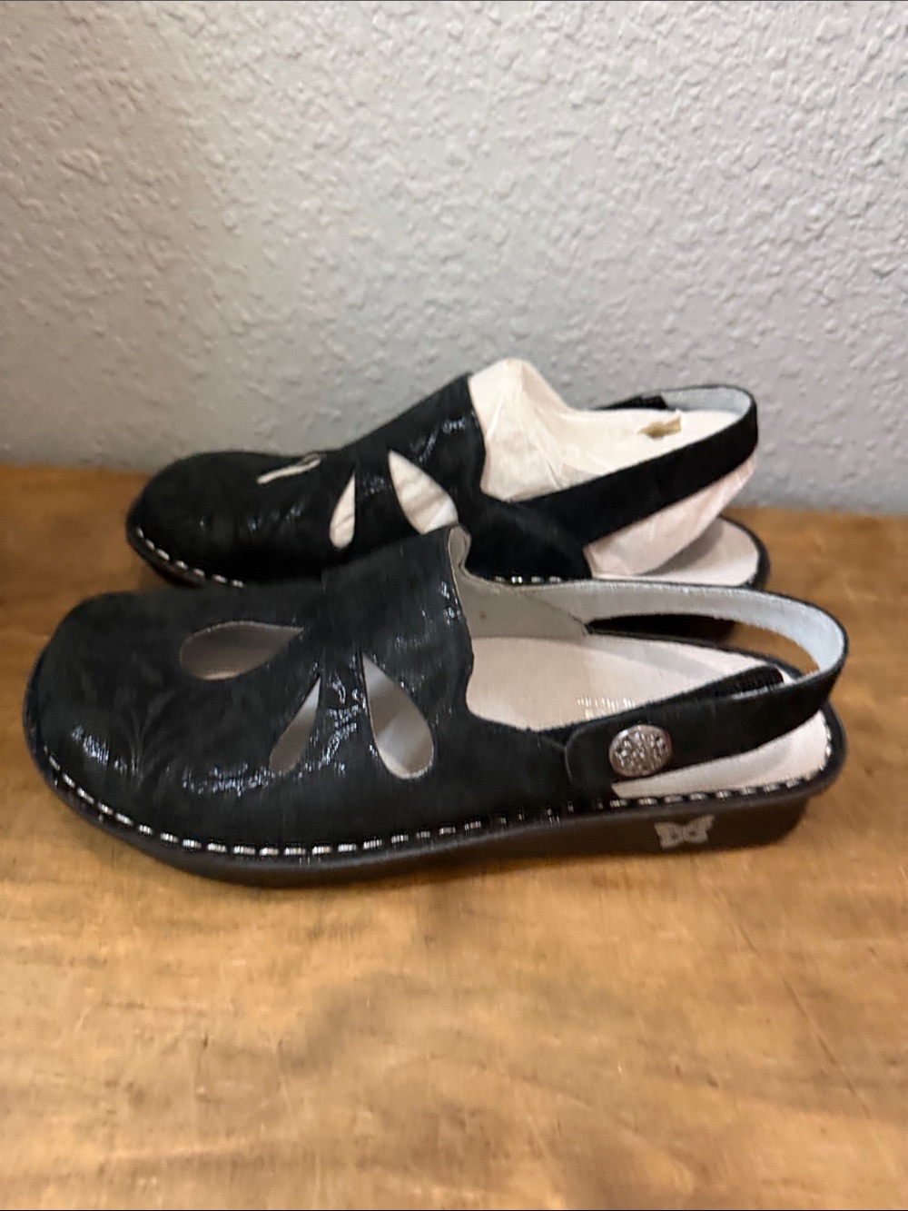 Alegria Black Cutout Leather Slingback Clogs
